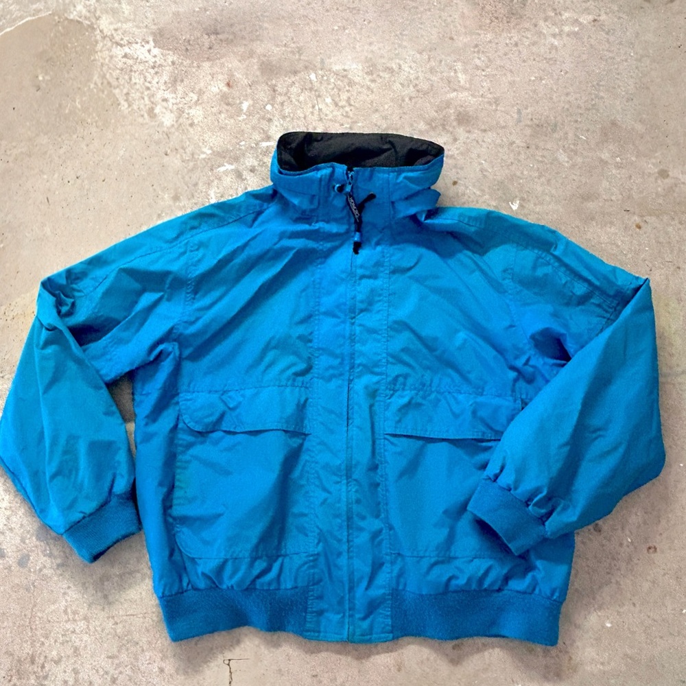 Vibrant Blue Windbreaker with Water-Resistant Sheen